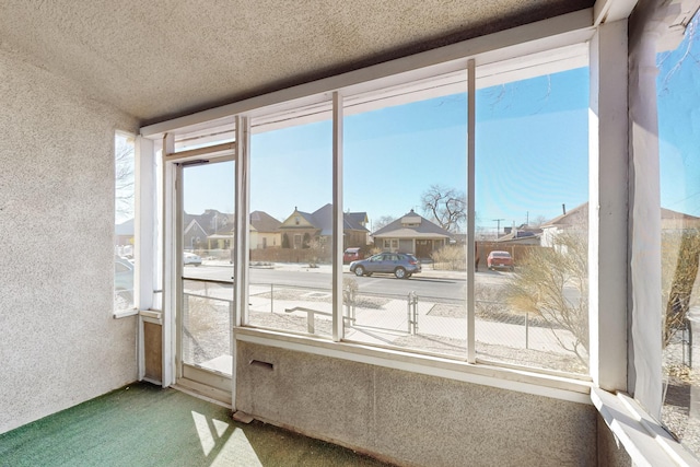 sunroom / solarium featuring a wealth of natural light