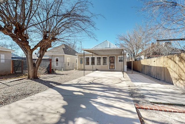 rear view of house with a patio area