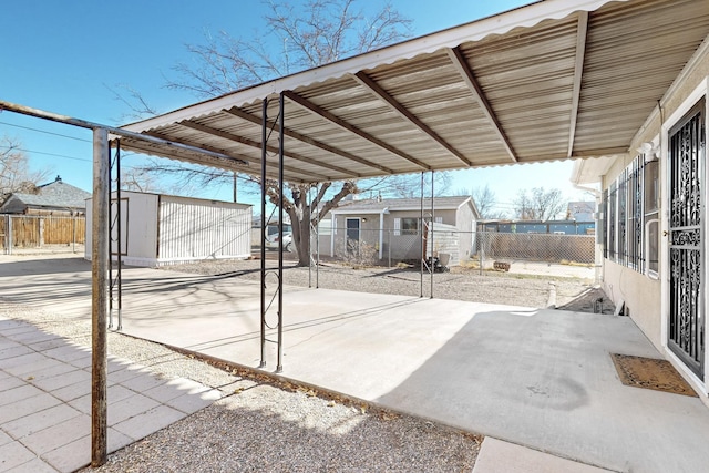 view of patio / terrace with a storage shed