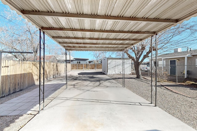 view of patio with a shed