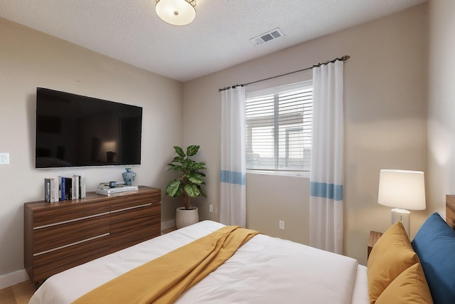 bedroom with a textured ceiling