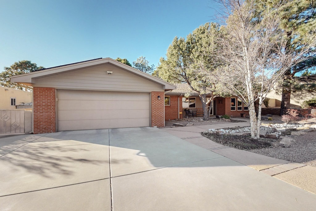 single story home featuring a garage