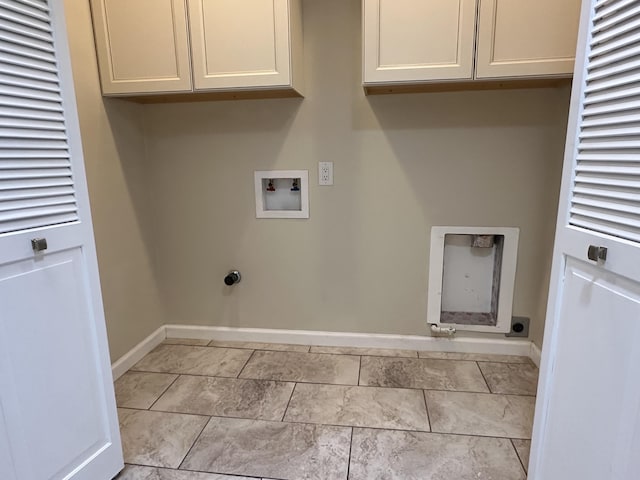 washroom featuring washer hookup, cabinet space, baseboards, and electric dryer hookup