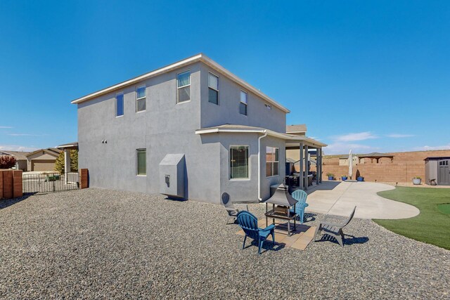 back of house featuring a patio