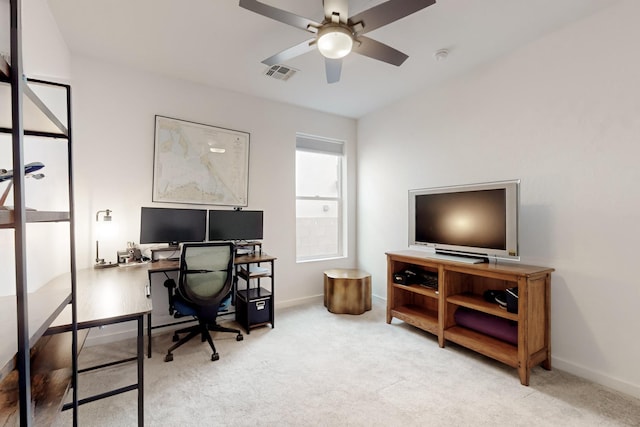 office area featuring ceiling fan and light colored carpet