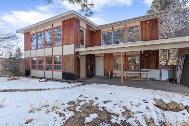 view of snow covered property