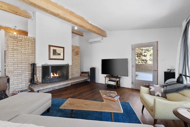 living room with a wall mounted air conditioner, dark hardwood / wood-style flooring, a fireplace, and beamed ceiling