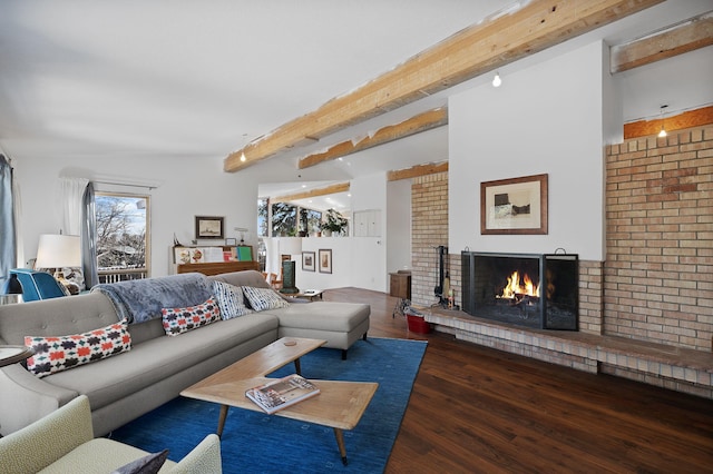 living room featuring a brick fireplace, dark hardwood / wood-style flooring, and beam ceiling