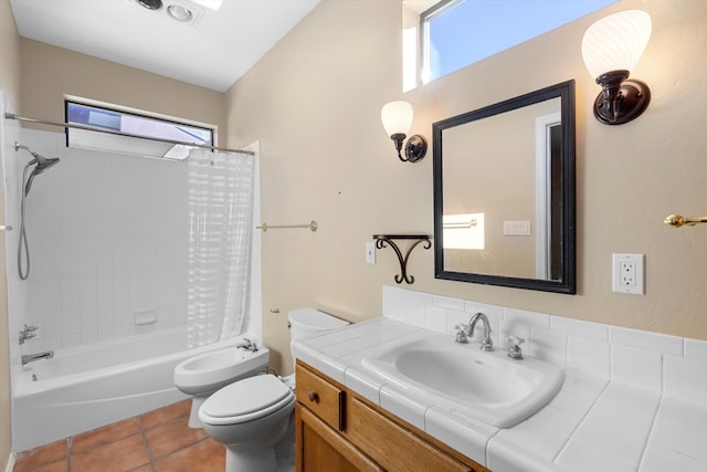 full bathroom featuring toilet, vanity, tile patterned floors, a bidet, and shower / bath combo with shower curtain