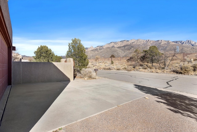 exterior space featuring a mountain view