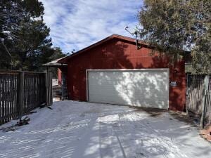 view of snow covered garage