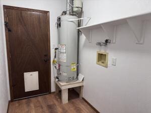 utility room with water heater