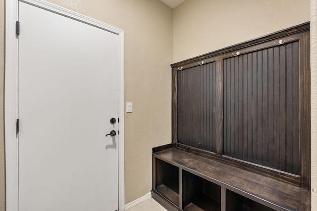 mudroom with light tile patterned floors