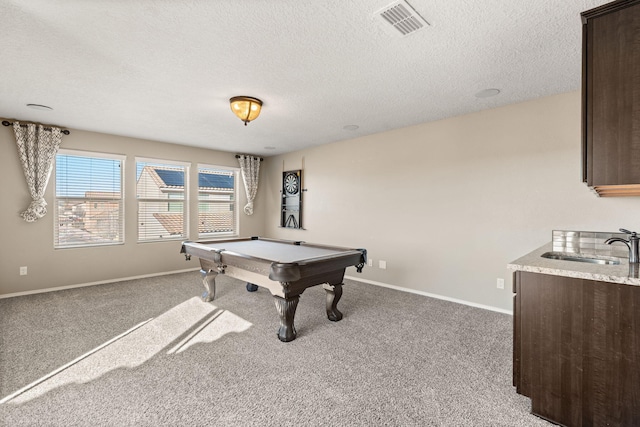 game room with carpet floors, sink, a textured ceiling, and billiards