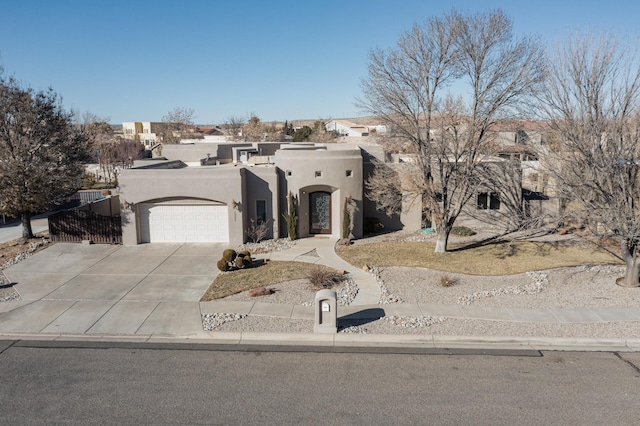 southwest-style home featuring a garage