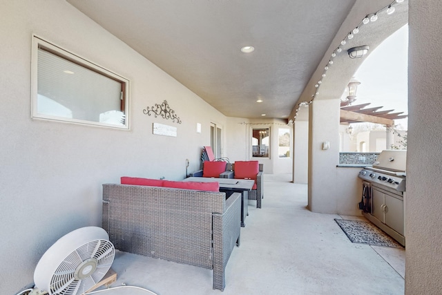 view of patio / terrace featuring a pergola, a grill, an outdoor kitchen, and outdoor lounge area