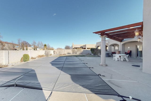 view of pool featuring a pergola and a patio area