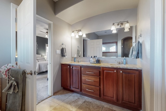 bathroom featuring ceiling fan, vanity, and tile patterned floors