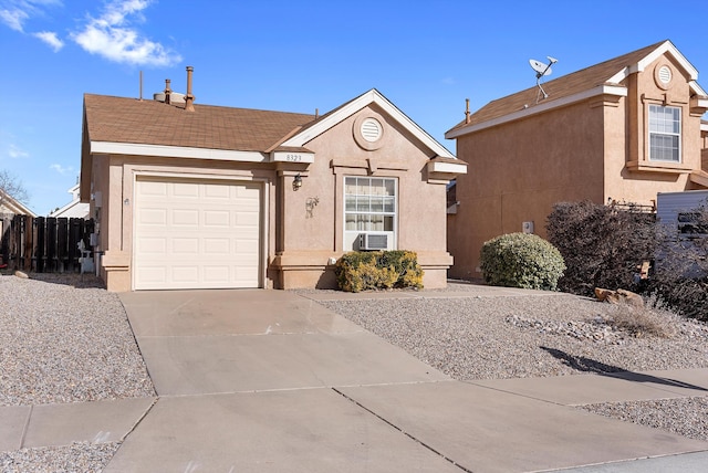 single story home featuring a garage