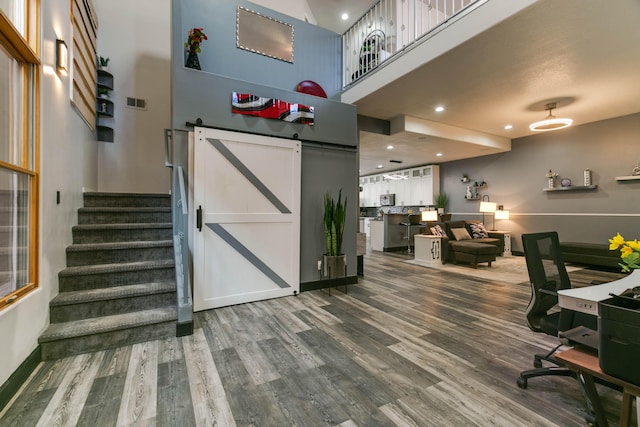 interior space featuring a barn door