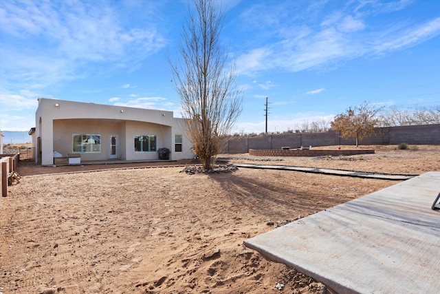 view of yard with a fenced backyard and a patio