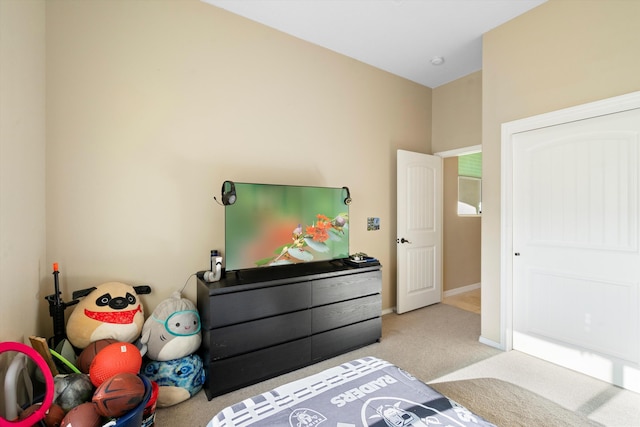 bedroom with light colored carpet