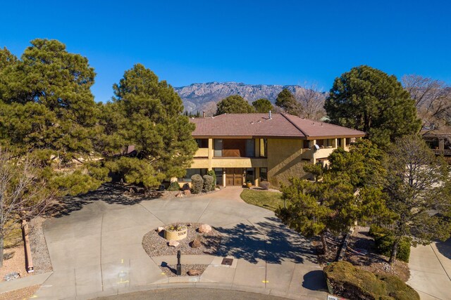 view of front of home featuring a mountain view