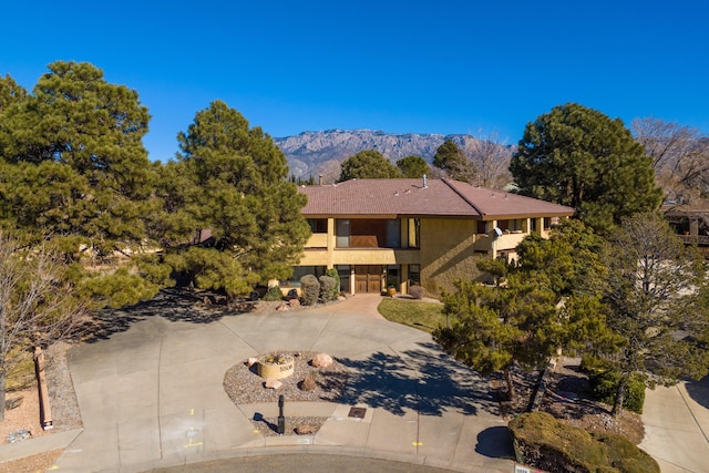 view of front of home with a mountain view