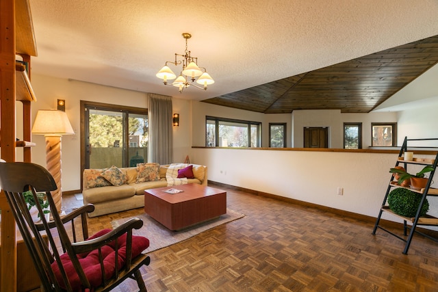 living room with lofted ceiling, an inviting chandelier, dark parquet floors, a textured ceiling, and wooden ceiling