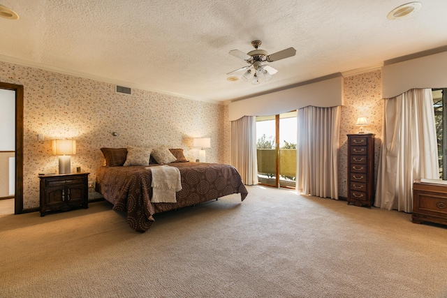 bedroom with crown molding, light colored carpet, a textured ceiling, ceiling fan, and access to exterior