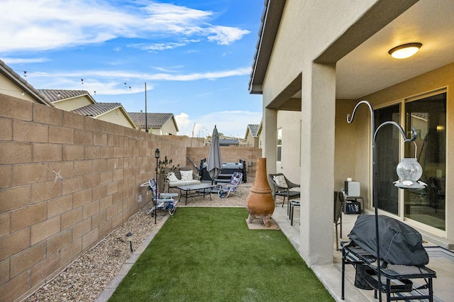 view of yard featuring a fenced backyard and a patio area