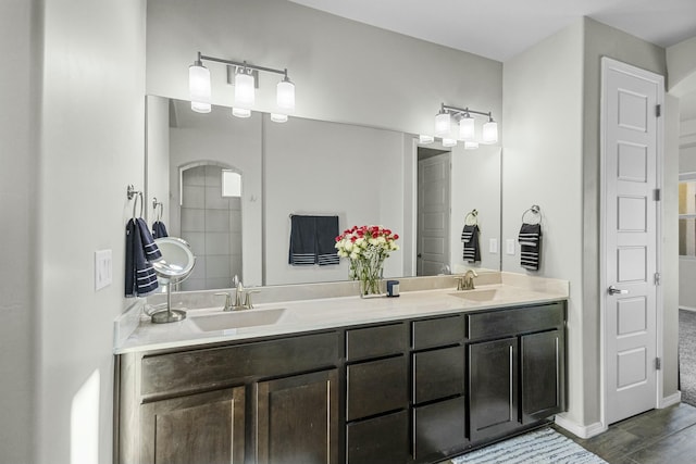 bathroom with hardwood / wood-style flooring and vanity