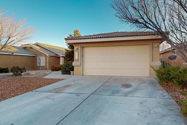 single story home with a garage