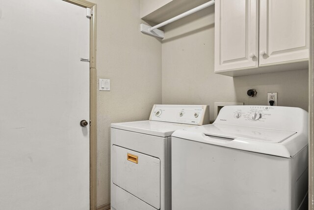 kitchen with light tile patterned floors, sink, a textured ceiling, and appliances with stainless steel finishes