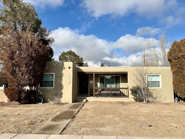 view of front of property featuring covered porch