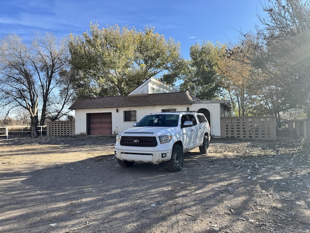 exterior space with a garage