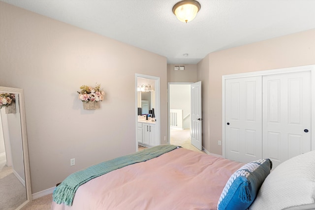 carpeted bedroom featuring a closet