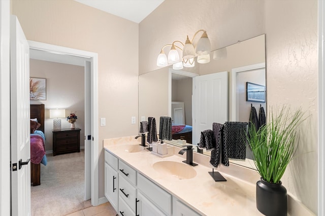 bathroom featuring vanity and tile patterned flooring