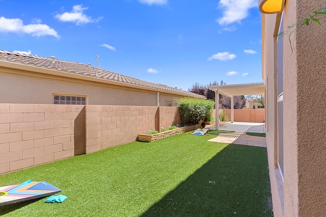 view of yard featuring a pergola and a patio area