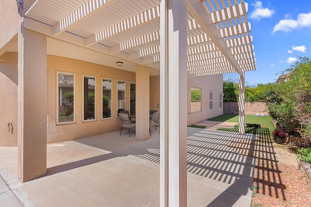 view of patio featuring a pergola