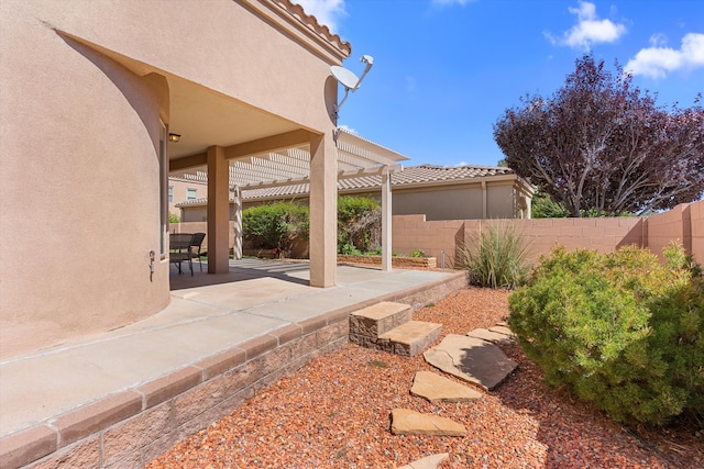 view of patio featuring a pergola