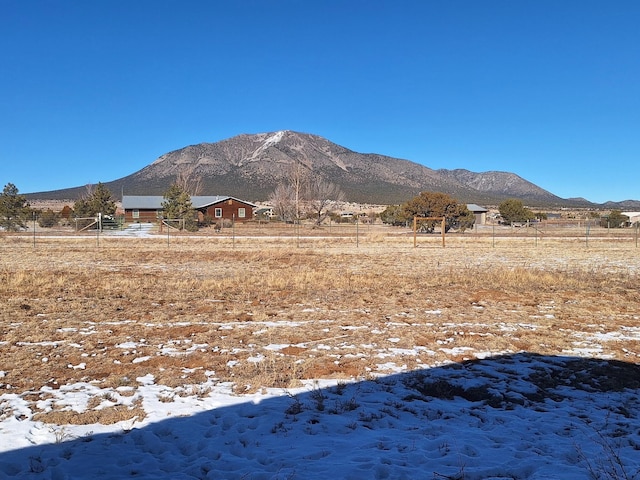 view of mountain feature with a rural view