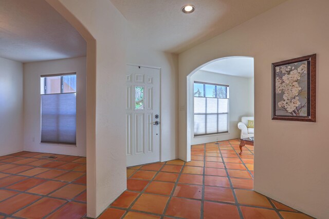 foyer entrance featuring tile patterned floors