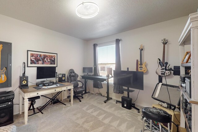 carpeted home office with a textured ceiling