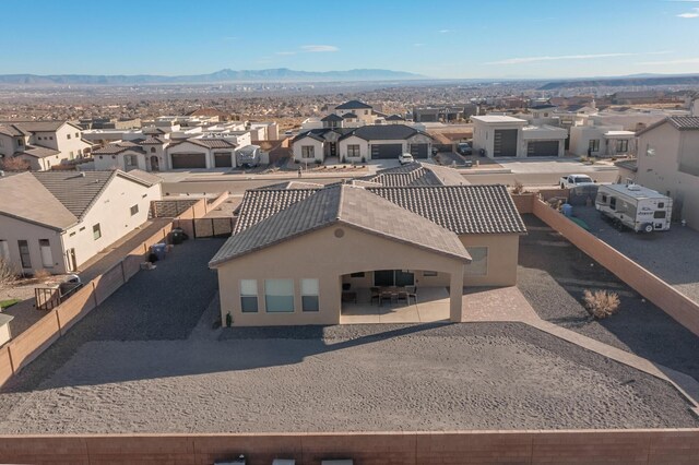 drone / aerial view featuring a mountain view