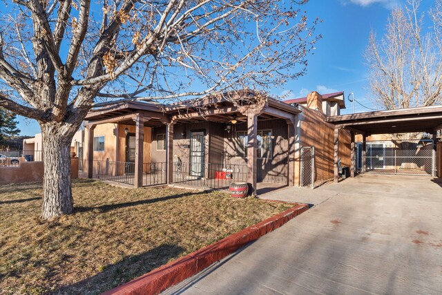 view of front of house with a carport