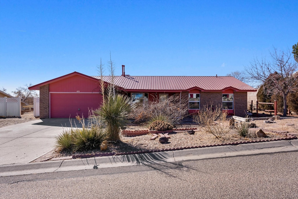 single story home with a garage