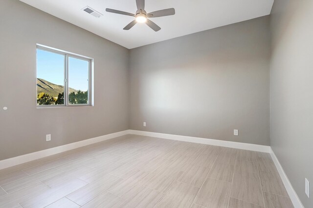 empty room with ceiling fan