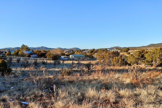 property view of mountains with a rural view