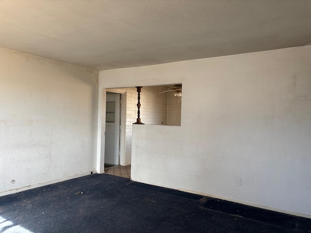 spare room featuring ceiling fan